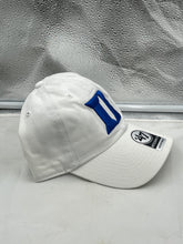 Load image into Gallery viewer, Close-up of the Duke Blue Devils NCAA '47 Brand White Clean Up Adjustable Strapback Hat emphasizing the clean white fabric and team logo.