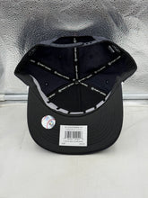 Load image into Gallery viewer, Model wearing the Cleveland Guardians MLB '47 Brand Navy Script Hitch Rope Adjustable Snapback Hat in a casual setting, showcasing the stylish look and comfort of this Cleveland Guardians hat.