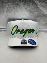 Load image into Gallery viewer, Oregon Ducks NCAA '47 Brand White Script Hitch Rope Adjustable Snapback Hat displayed on a flat surface, showcasing the stylish Oregon Ducks hat design.