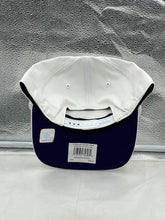 Load image into Gallery viewer, Minnesota Vikings NFL '47 White Script Hitch Rope Snapback Adjustable Hat worn by a fan at a game, demonstrating team pride and stylish look.