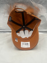 Load image into Gallery viewer, Texas Longhorns NCAA '47 Brand Orange Clean Up Adjustable Strapback Hat paired with outdoor gear, illustrating its practical use for sunny days during tailgates.