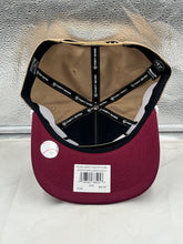 Load image into Gallery viewer, Lifestyle shot of fans wearing the Phillies Vs Royals 1980 World Series Dueling MLB '47 Khaki Hitch Adjustable Hat at a baseball game.