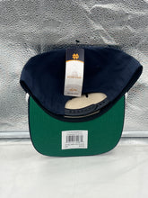 Load image into Gallery viewer, Close-up of the adjustable snapback mechanism on the Notre Dame Fighting Irish NCAA '47 Navy Script Hitch Hat for a customizable fit.