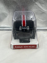 Load image into Gallery viewer, South Carolina Gamecocks NCAA Riddell Speed Black Mini Helmet displayed on a shelf, illustrating its role as a striking centerpiece for home or office decor.