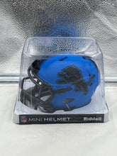 Load image into Gallery viewer, Close-up view of the Detroit Lions NFL Riddell Speed Blue Rave Alternate Replica Mini Helmet highlighting its unique design and detailing.
