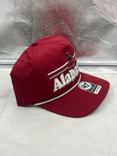 Load image into Gallery viewer, Alabama Crimson Tide hat worn by a fan, representing team spirit at a game, emphasizing the throwback style and casual fit.
