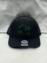 Load image into Gallery viewer, Notre Dame Fighting Irish NCAA '47 Brand Black Adjustable Trucker Snapback Hat shown on a model outdoors, showcasing team spirit and stylish design.