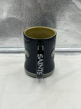 Load image into Gallery viewer, Durable New Orleans Saints NFL Boelter 14oz Mug Cup, ideal for any beverage, emphasizing its sturdy construction and generous capacity.