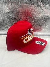 Load image into Gallery viewer, Group of fans wearing Kansas City Chiefs NFL '47 Red Script Hitch Snapback Adjustable Hats while cheering at a football game.