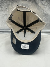 Load image into Gallery viewer, Back view of the Winnipeg Jets NHL '47 Brand Natural Two Tone Clean Up Adjustable Strapback Hat, illustrating the adjustable strap for a customizable fit.