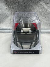 Load image into Gallery viewer, Close-up of the Tampa Bay Buccaneers NFL Riddell Speed Pewter Gray Replica Mini Helmet highlighting its high-quality craftsmanship and pewter gray finish.