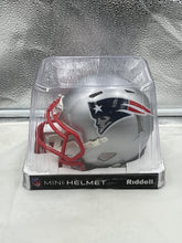 Load image into Gallery viewer, Front view of New England Patriots NFL Silver Riddell Speed Replica Mini Helmet highlighting the eye-catching silver finish.