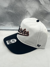 Load image into Gallery viewer, Close-up view of Baltimore Orioles MLB '47 Brand White TT Script Hitch Adjustable Snapback Hat showcasing the quality embroidery and comfortable snapback design.