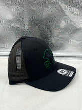 Load image into Gallery viewer, Stylish arrangement of the Notre Dame Fighting Irish NCAA '47 Brand Black Adjustable Trucker Snapback Hat on a flat surface, emphasizing its modern design.