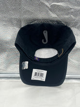 Load image into Gallery viewer, Model wearing the Minnesota Vikings NFL '47 Brand Black Clean Up Strapback Adjustable Hat, perfect for game day or everyday casual style.