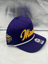 Load image into Gallery viewer, Minnesota Vikings NFL '47 Brand Purple Rope Script Hitch Snapback Adjustable Hat worn by a fan at a game, displaying team spirit and loyalty.