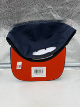Load image into Gallery viewer, Model wearing the Auburn Tigers NCAA hat in a casual outfit, demonstrating its versatility and trendy appeal.