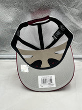 Load image into Gallery viewer, Lifestyle shot of a person wearing the Washington Commanders NFL '47 Brand Red Trucker Mesh Strapback Adjustable Hat at a casual outdoor event.