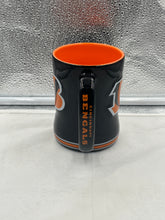 Load image into Gallery viewer, Cincinnati Bengals NFL Logo Brands 14oz Mug Cup filled with coffee, highlighting its stylish design and ideal size for any Bengals fan.