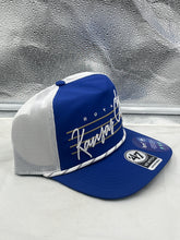 Load image into Gallery viewer, Kansas City Royals MLB '47 Brand Blue Script Hitch Rope Adjustable Snapback Hat worn by a fan, demonstrating its versatility for both game days and casual outings.
