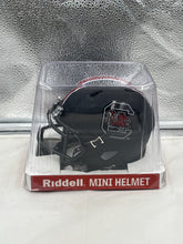 Load image into Gallery viewer, Close-up view of the South Carolina Gamecocks NCAA Riddell Speed Black Mini Helmet, highlighting its high-quality craftsmanship and detail resembling full-size helmets.