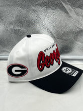 Load image into Gallery viewer, Georgia Bulldogs NCAA '47 Brand White TT Script Hitch Adjustable Snapback Hat worn by a fan at a stadium, demonstrating team spirit and style.