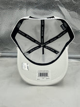 Load image into Gallery viewer, Person wearing the Philadelphia Eagles NFL '47 Throwback White Rope Hitch Snapback Adjustable Hat at a game, displaying team spirit.