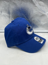 Load image into Gallery viewer, Close-up view of the Vancouver Canucks NHL '47 Brand Blue Clean Up Adjustable Strapback Hat highlighting the quality fabric and detailed stitching.