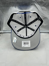 Load image into Gallery viewer, Hartford Whalers NHL '47 Brand White Diamond Hitch Adjustable Snapback Hat - Lifestyle image presented in an outdoor setting to emphasize its sporty appeal.