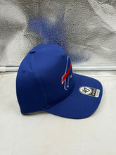 Load image into Gallery viewer, Buffalo Bills hat displayed on a casual outfit, demonstrating its stylish design that enhances any fan's wardrobe for game days or everyday wear.