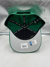 Load image into Gallery viewer, Group of friends wearing the Oregon Ducks NCAA '47 Brand Green Hitch City Line Adjustable Snapback Hat during a tailgate event, showcasing camaraderie and pride in their Oregon Ducks hat.