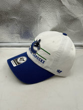 Load image into Gallery viewer, Close-up view of Vancouver Canucks NHL '47 Brand White Two Tone Clean Up Strapback Adjustable Hat showcasing intricate design and logo - essential Vancouver Canucks hat.