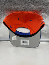 Load image into Gallery viewer, Denver Broncos NFL '47 Throwback Orange TT Diamond Hitch Snapback Adjustable Hat worn by a fan at a game, demonstrating team spirit and style.