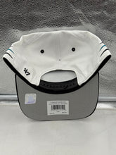 Load image into Gallery viewer, Lifestyle image of a person wearing the Jacksonville Jaguars NFL '47 Brand White Diamond Hitch Snapback Adjustable Hat, perfect for game day or casual outings.