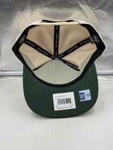 Load image into Gallery viewer, Lifestyle image featuring a person wearing the Miami Hurricanes NCAA '47 Orange Bowl Natural TT Hitch Adjustable Snapback Hat - a trendy Miami Hurricanes hat for any occasion.