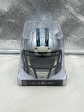 Load image into Gallery viewer, Carolina Panthers NFL Silver Riddell Speed Mini Helmet displayed on a shelf, perfect for collectors and fans.