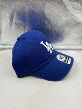 Load image into Gallery viewer, Group of fans wearing the Los Angeles Dodgers MLB '47 Brand Blue Clean Up Adjustable Strapback Hat at a baseball game, showing team spirit and loyalty.