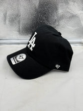 Load image into Gallery viewer, Side view of the Los Angeles Dodgers hat featuring the classic black color and adjustable strapback design for a perfect fit.