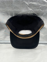 Load image into Gallery viewer, New York Knicks NBA '47 Brand Black Charlton Hitch Snapback Adjustable Hat worn by a fan, displaying team pride at a game.