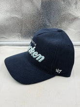 Load image into Gallery viewer, Close-up of the Seattle Kraken NHL '47 Brand Corduroy Navy Hitch Adjustable Snapback Hat highlighting the textured corduroy fabric and adjustable snapback feature.