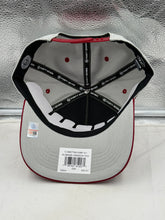 Load image into Gallery viewer, Lifestyle image of a person wearing the Alabama Crimson Tide hat at a tailgate event, demonstrating its perfect blend of style and team spirit.
