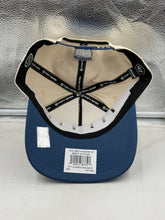 Load image into Gallery viewer, Flat lay of the Colorado Avalanche NHL '47 Throwback Natural TT Hitch Adjustable Snapback Hat on a wooden surface, showing its versatile design suitable for casual wear.