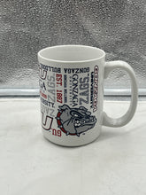 Load image into Gallery viewer, Gonzaga Bulldogs NCAA Spirit Style 15oz Coffee Mug Cup in a lifestyle setting, depicting its use for coffee and showcasing the team spirit.