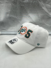 Load image into Gallery viewer, Close-up view of the Miami Dolphins NFL '47 Throwback 305 White Clean Up Adjustable Strapback Hat, highlighting the soft fabric and vintage logo details.