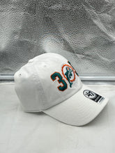 Load image into Gallery viewer, Miami Dolphins NFL '47 Throwback 305 White Clean Up Adjustable Strapback Hat with embroidered logo and adjustable strap design.
