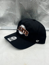Load image into Gallery viewer, Close-up of the San Francisco Giants MLB '47 Brand Throwback Black Hitch Adjustable Snapback Hat, highlighting the quality fabric and adjustable snapback closure.