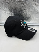 Load image into Gallery viewer, San Jose Sharks NHL '47 Brand Throwback Black Clean Up Adjustable Hat angled view highlighting the throwback design, an essential accessory for any San Jose Sharks hat collection.
