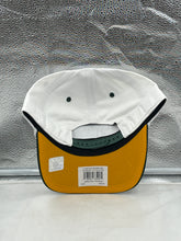 Load image into Gallery viewer, Lifestyle image of a person wearing the Green Bay Packers NFL '47 White TT Roscoe Hitch Rope Snapback Adjustable Hat, showing off the stylish design and team spirit during a game day.