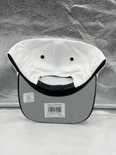 Load image into Gallery viewer, Fan wearing the Philadelphia Eagles NFL '47 White TT Roscoe Hitch Rope Snapback Adjustable Hat at a football game, showcasing team spirit.