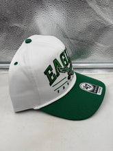 Load image into Gallery viewer, Lifestyle image of a person wearing the Philadelphia Eagles NFL '47 Throwback White Hitch Rope Snapback Adjustable Hat at a football game.